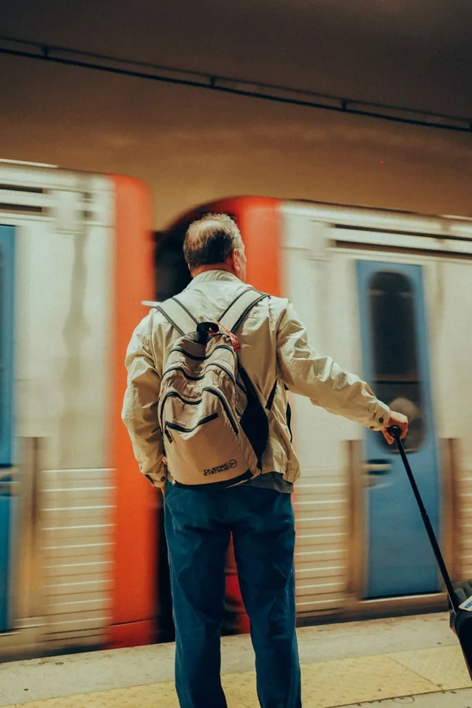 a-man-with-his-luggage-in-hand-waiting